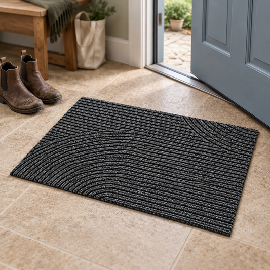 Grey entry door mat in a mudroom