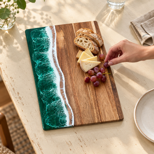 Ocean Wave Resin Acacia Serving Board on a dining table